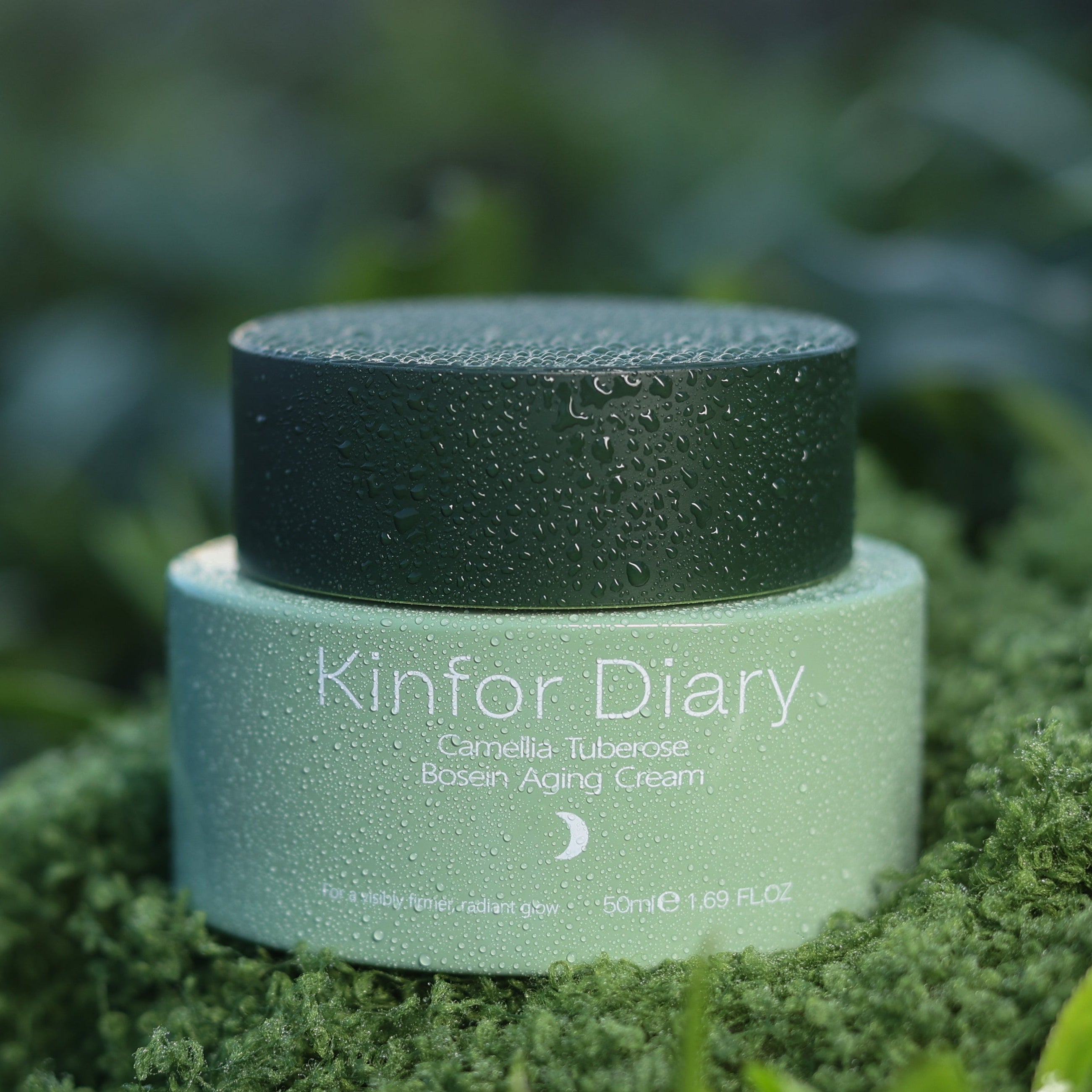 Cosmetic jar labeled 'Kinfor Diary' on a green leafy background